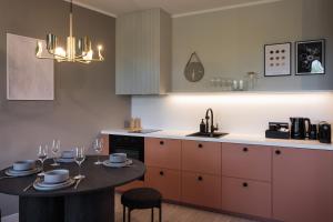 Kuchyň nebo kuchyňský kout v ubytování Centra Nams - Center Apartments