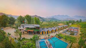 an overhead view of a resort with a swimming pool at Homestay Suối Khoáng Minh Hằng in Yên Bái