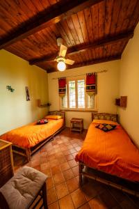 Кровать или кровати в номере Casuzza Duci duci
