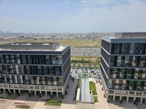 an aerial view of two tall buildings and a street at Dubai Hills Park Heights 2 in Dubai