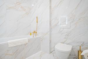 Kúpeľňa v ubytovaní Rabie Aparthotel