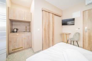 Posteľ alebo postele v izbe v ubytovaní Rabie Aparthotel