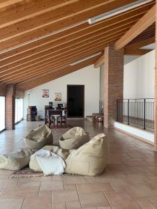 a large living room with a couch on the floor at Locanda Bistrot Zia Nena 