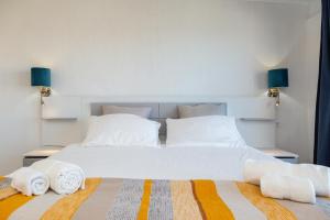 Postel nebo postele na pokoji v ubytování Sa Dommu e Mare