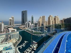 a view of a city with a bridge over a river at Frank Porter - Marina Star in Dubai