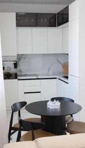 Kuchyň nebo kuchyňský kout v ubytování Home DeLuis