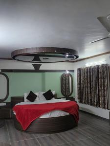 Llit o llits en una habitació de Hotel Sunshine