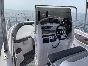 a boat with its door open on the water at Bluline21 Open Speedboat Private Charters in Sliema
