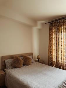 a bedroom with a bed with two teddy bears on it at Apartment in town centre and nearby the lake in Riva del Garda