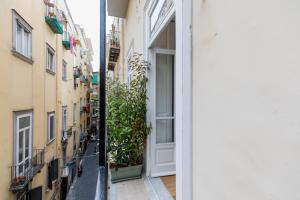 a view of an alley from a building at Piazza San Domenico Luxury Suites in Naples