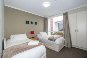 Voodi või voodid majutusasutuse Methven Nest Apartment toas