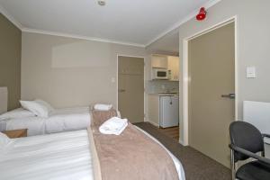 Voodi või voodid majutusasutuse Methven Nest Apartment toas