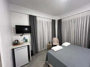 Un pat sau paturi într-o cameră la Emel Hanım butik otel&restoran