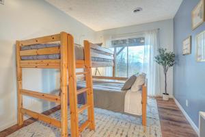 a bedroom with two bunk beds in a room at Amazing Mtn Views - 10 Min to VT - Firepit & Patio in Blacksburg