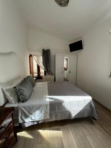 Postel nebo postele na pokoji v ubytování B&B CASA GARGIULO