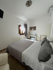Postel nebo postele na pokoji v ubytování B&B CASA GARGIULO