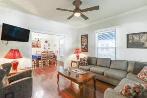 a living room with a couch and a table at Harrison Family Home with Grill - Near Downtown! in Harrison