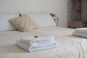 Postel nebo postele na pokoji v ubytování b&b Adamà