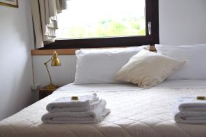 Postel nebo postele na pokoji v ubytování b&b Adamà