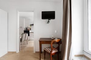 TV a/nebo společenská místnost v ubytování Casa Marisa