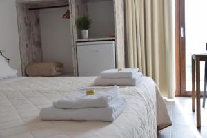 Postel nebo postele na pokoji v ubytování b&b Adamà
