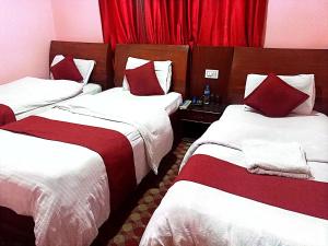 Ένα ή περισσότερα κρεβάτια σε δωμάτιο στο The hotel mountain Taplejung