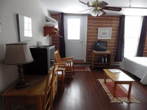 TV in/ali zabaviščno središče v nastanitvi Manoir Charlevoix