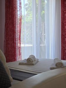 Posteľ alebo postele v izbe v ubytovaní Elite Residence Flos