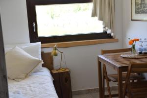 Posezení v ubytování b&b Adamà + 23 fotografií