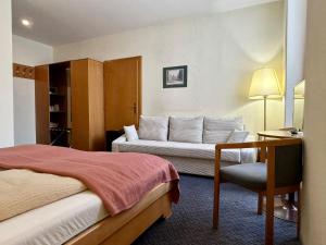Кровать или кровати в номере Self Check-in Hotel Am Schottenpoint