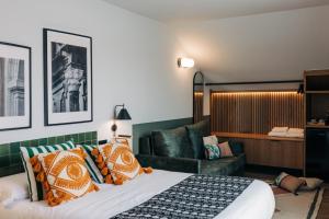 Postel nebo postele na pokoji v ubytování Doña Lola Alojamientos Boutique