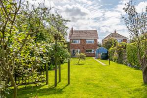 Aed väljaspool majutusasutust Beachcomber