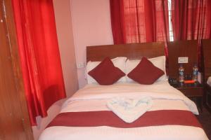 Ένα ή περισσότερα κρεβάτια σε δωμάτιο στο The hotel mountain Taplejung