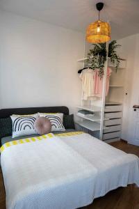 Posteľ alebo postele v izbe v ubytovaní Apartmány MIS