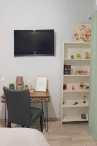 A television and/or entertainment centre at Agis home
