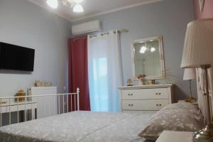 A bed or beds in a room at Agis home