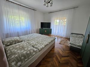 En eller flere senge i et værelse på Štúrovo rodinný dom