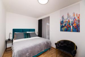 Postel nebo postele na pokoji v ubytování Scaletta Rooms