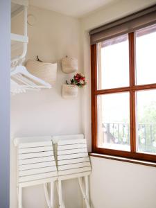 Postel nebo postele na pokoji v ubytování Pipacs Apartman