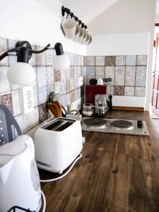 Posezení v ubytování Pipacs Apartman