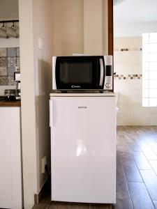 Kuchyň nebo kuchyňský kout v ubytování Pipacs Apartman