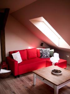 Posezení v ubytování Pipacs Apartman