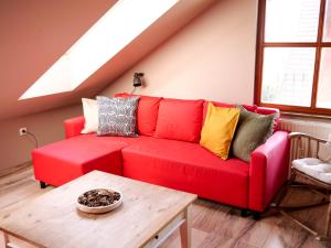 Posezení v ubytování Pipacs Apartman