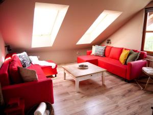 Posezení v ubytování Pipacs Apartman