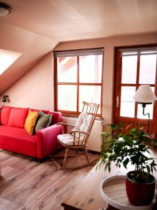 Posezení v ubytování Pipacs Apartman