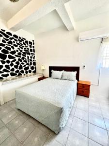 En eller flere senger på et rom på Caribbean Breeze