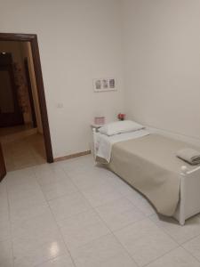 Letto o letti in una camera di Orchidea1