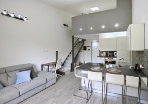 Kuchyňa alebo kuchynka v ubytovaní Boutique Apartment “Diviso Due”