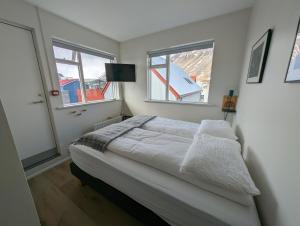 Postel nebo postele na pokoji v ubytování The Ísafjörður Inn by Ourhotels