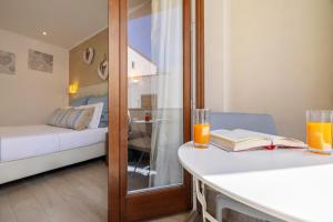 Postel nebo postele na pokoji v ubytování Hotel Soffio D'Estate